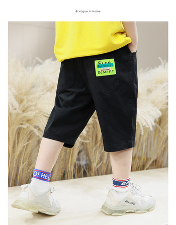 Παιδικό παντελόνι σε μαύρο χρώμα και έμβλημα