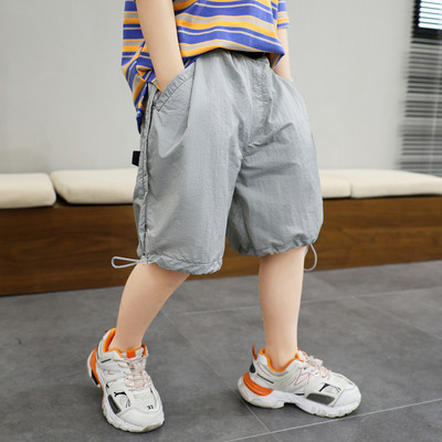 Сиви детски панталони с джобове и връзки 