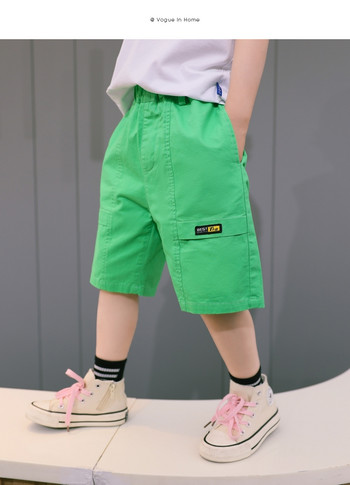 Παιδικό πράσινο παντελόνι με μήκος 3/4 και τσέπες
