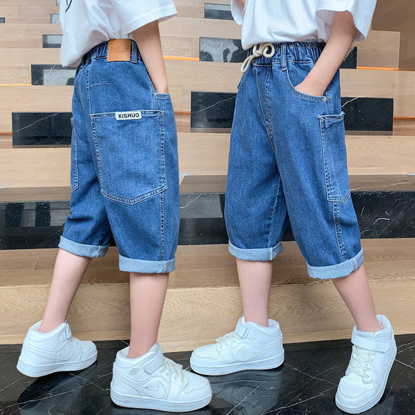 Детски дънкови панталони с връзки в син цвят 