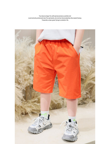 Παιδικό παντελόνι με μήκος 3/4 και τσέπες - πορτοκαλί χρώμα