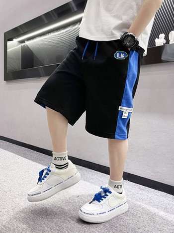 Παιδικό βαμβακερό παντελόνι για αγόρια - δίχρωμο με τσέπη και εμβλήματα