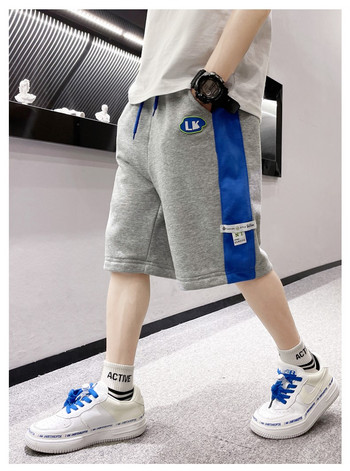 Παιδικό βαμβακερό παντελόνι για αγόρια - δίχρωμο με τσέπη και εμβλήματα