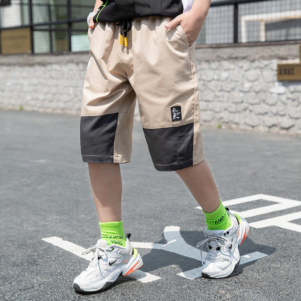 Детски панталони с 3/4 дължина и джобове