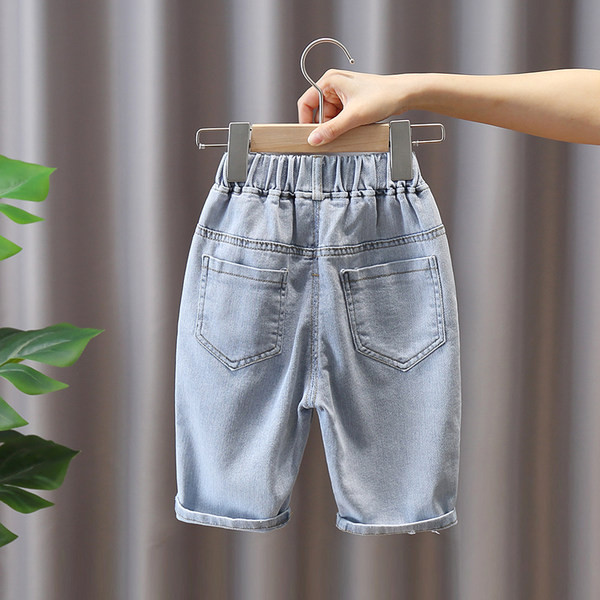 Актуални детски дънки с апликация и ластична талия