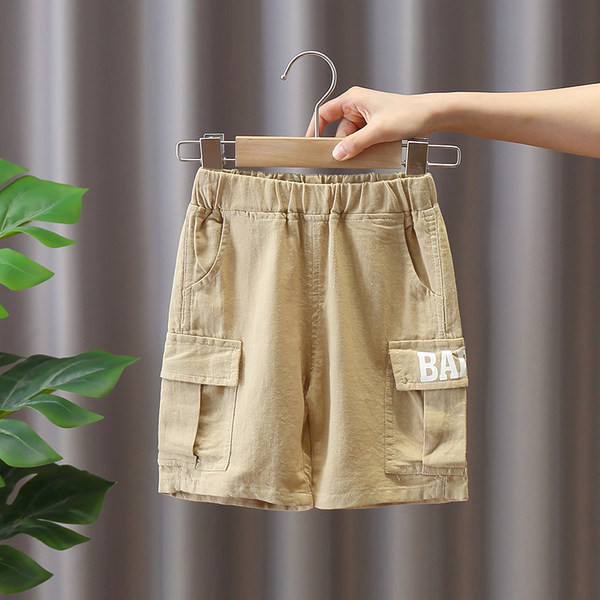 Къси детски панталони с джобове и ластична талия в два цвята