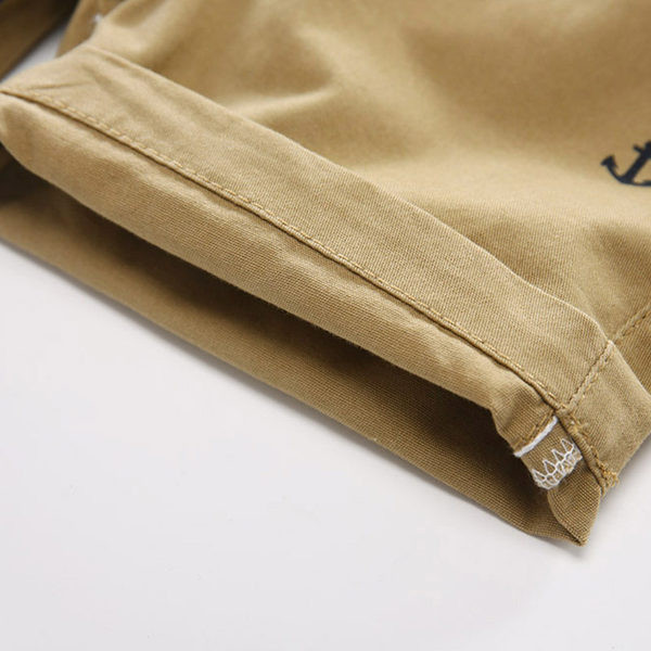 Модерни къси детски панталони за момчета в тъмносин и бежов цвят