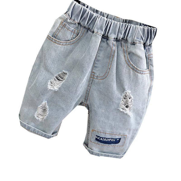 Детски 3/4 дънки за момчета - разкъсан елемент