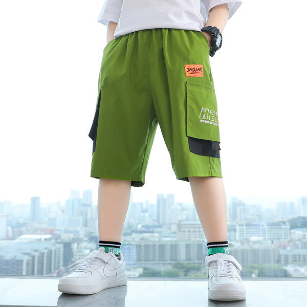 Детски къси панталони със страничен джоб и надпис 