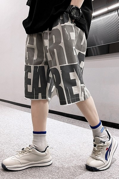 Lastele kirjade ja taskutega püksid - poistele