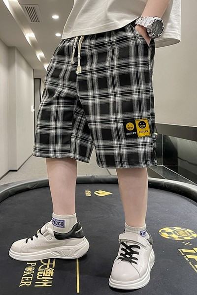 Детски карирани панталони с връзки и шампа 