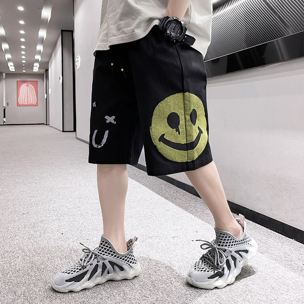 Aplikatsiooni ja taskutega vabaaja lastepüksid