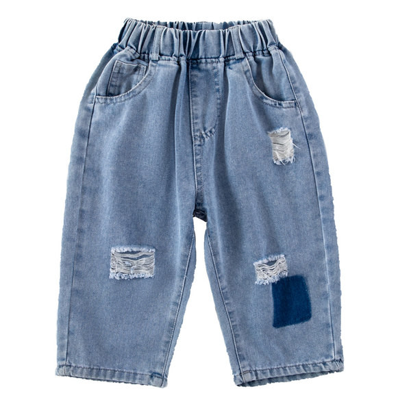 Модерни дънки със скъсани мотиви и ластична талия