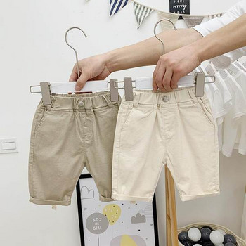 Детски панталони с джобове и апликация