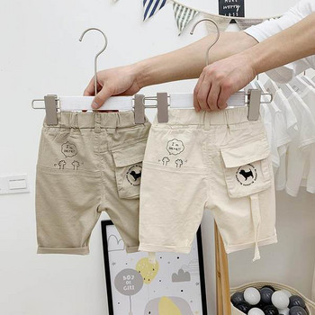Детски панталони с джобове и апликация