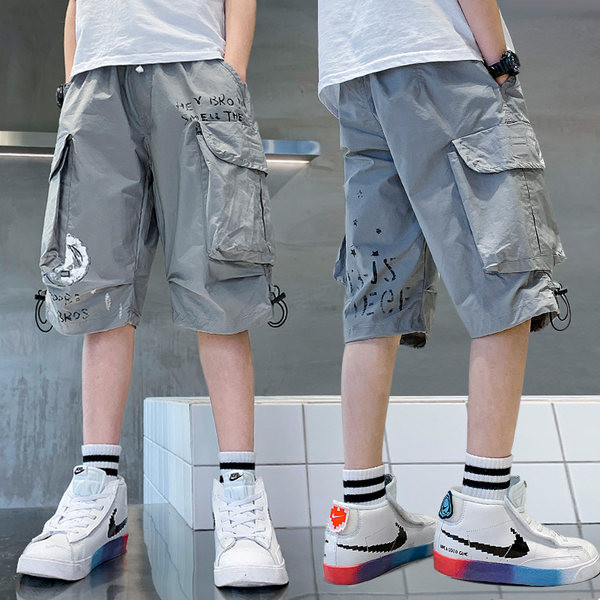 Taskute ja lipsudega laste vabaajapüksid poistele