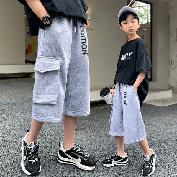 Taskutega vabaaja püksid 7/8 pikkusega