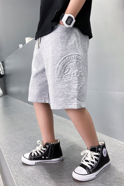 Laste vabaajapüksid kirja ja lipsudega - kahes värvitoonis