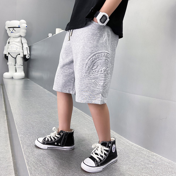 Laste vabaajapüksid kirja ja lipsudega - kahes värvitoonis