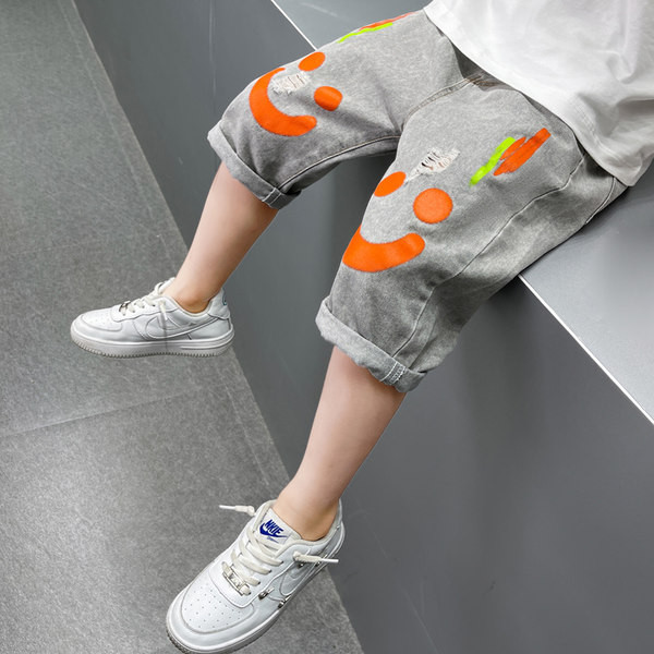 Ежедневни детски дънкови панталони с цветен десен