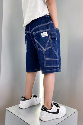 Модерни детски дънки с джобове и копче