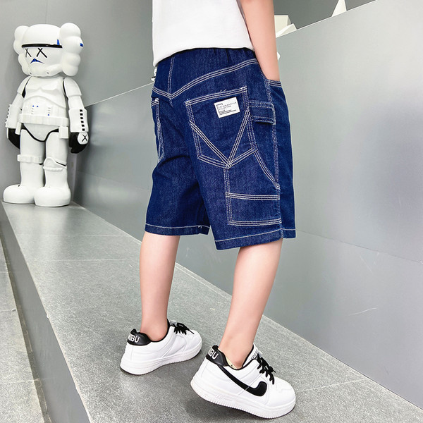 Moodsad taskute ja nööbiga lasteteksad