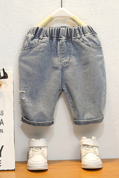 Laste 3/4 kummiku ja taskutega püksid