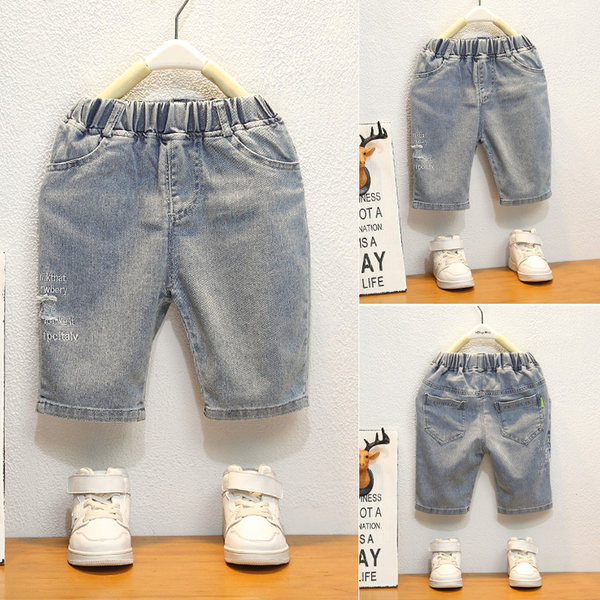 Laste 3/4 kummiku ja taskutega püksid