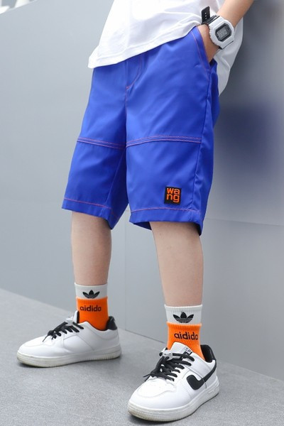 Детски летни шорти с джобове и надпис 