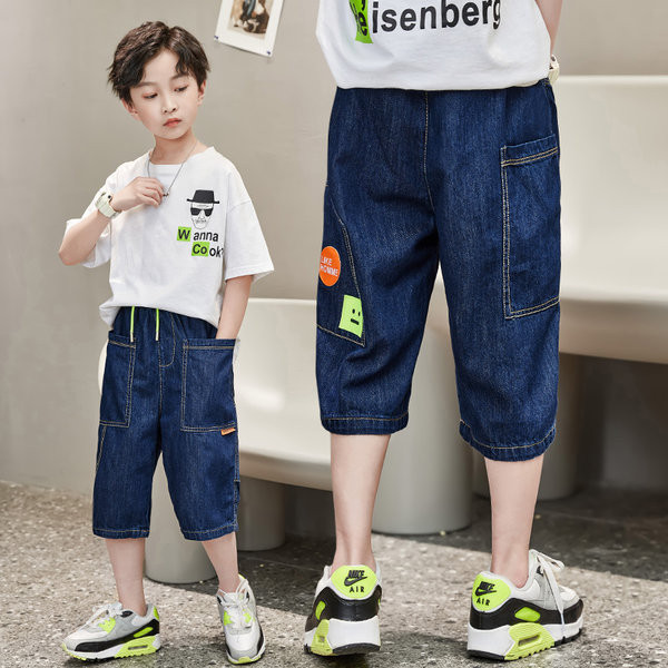 Актуални детски дънки с джобове и връзки 