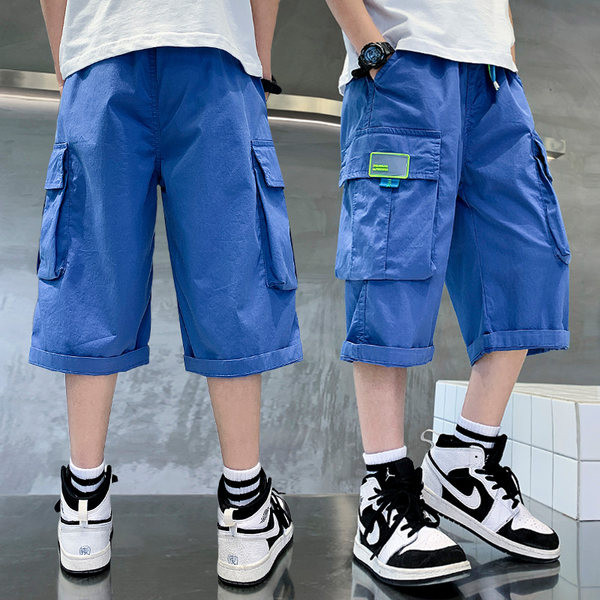 Modern, kék színű zsebes gyereknadrág