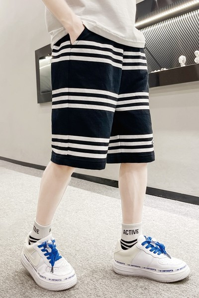 Laste vabaaja laiad taskutega püksid