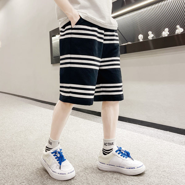 Laste vabaaja laiad taskutega püksid