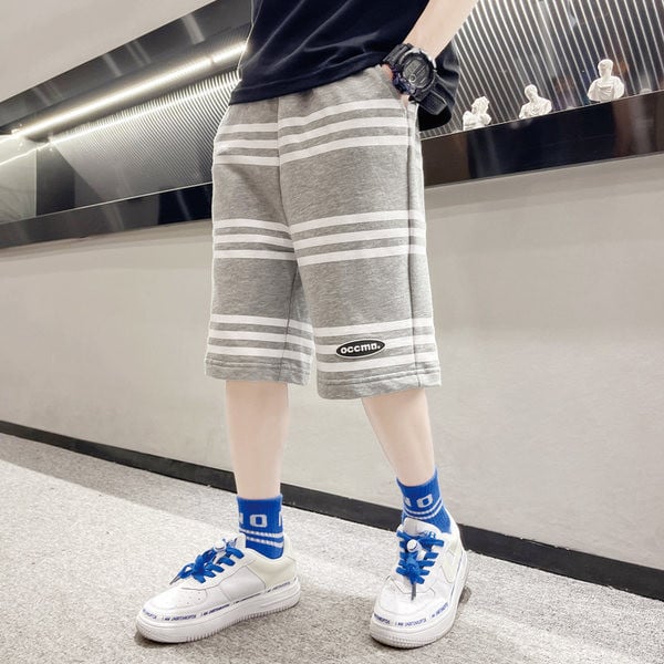 Laste vabaaja laiad taskutega püksid