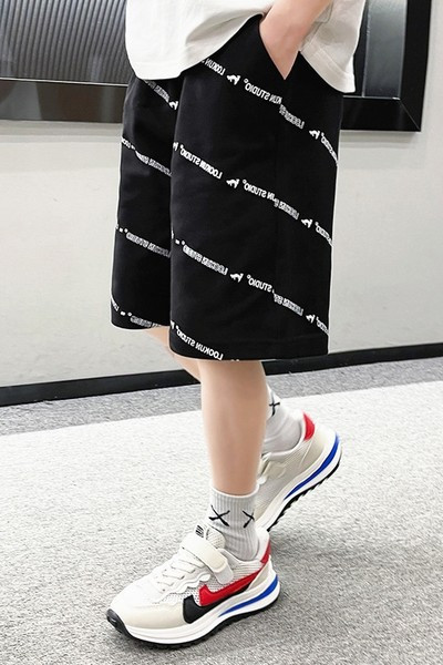 Laste vabaaja 3/4 püksid kirjadega