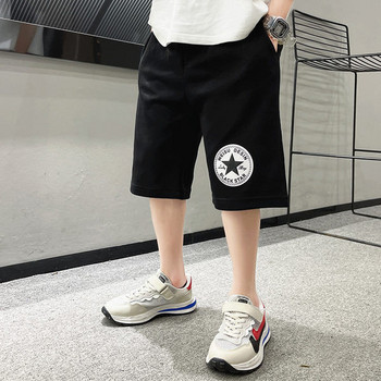 Детски панталони в сив и черен цвят с апликация 