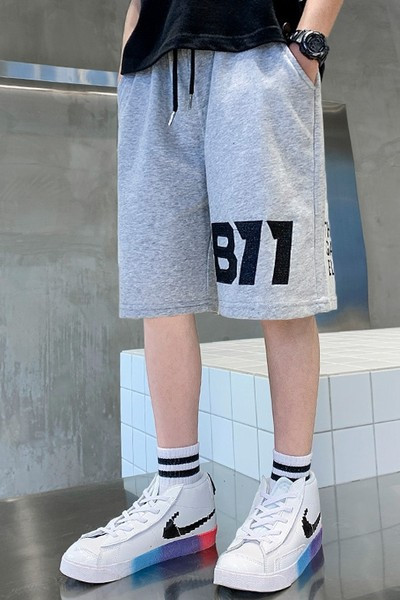 Спортни детски панталони с връзки и джобове