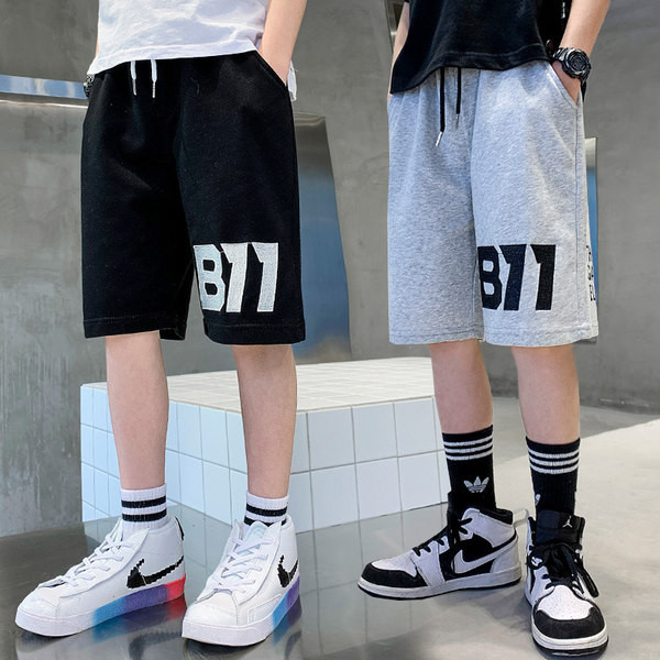 Спортни детски панталони с връзки и джобове