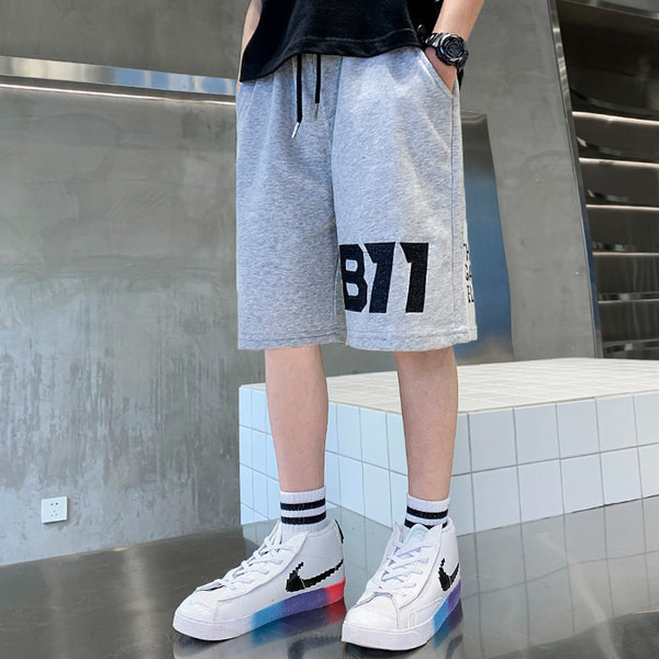 Спортни детски панталони с връзки и джобове