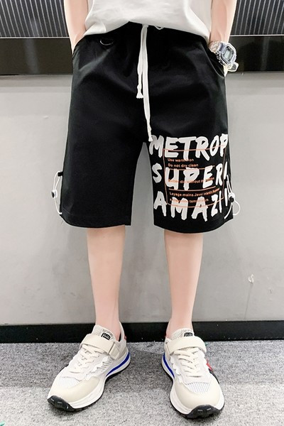 Laste lühikesed püksid kirjade ja lipsudega