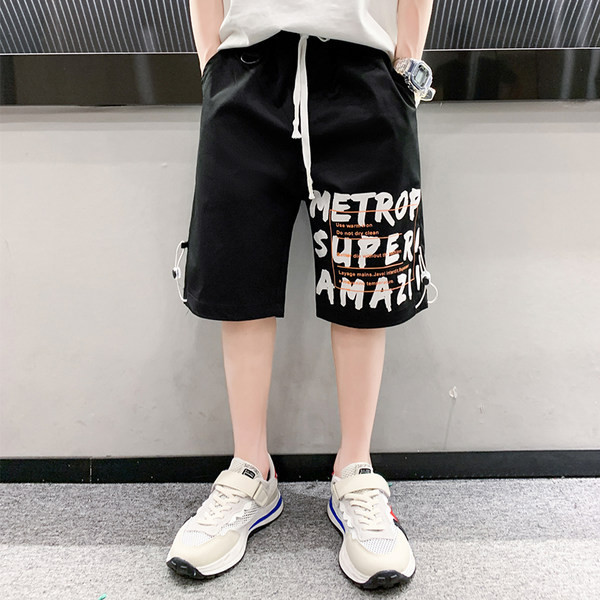 Laste lühikesed püksid kirjade ja lipsudega