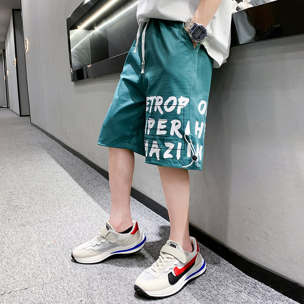 Laste lühikesed püksid kirjade ja lipsudega