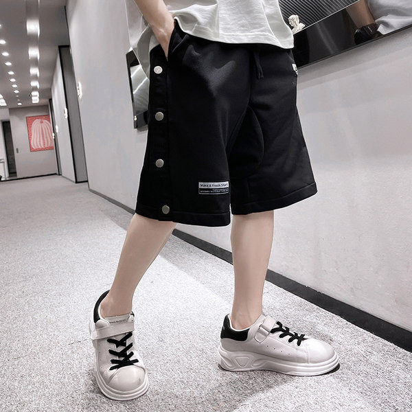 Laste puuvillased nööpide ja taskutega lühikesed püksid