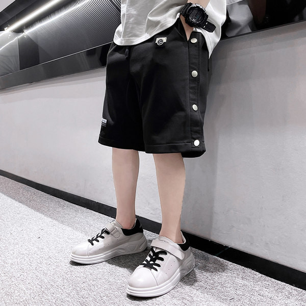 Laste puuvillased nööpide ja taskutega lühikesed püksid