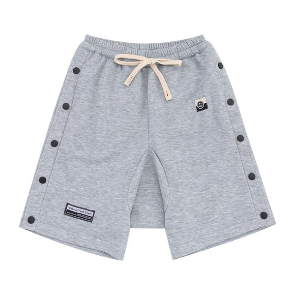 Laste puuvillased nööpide ja taskutega lühikesed püksid