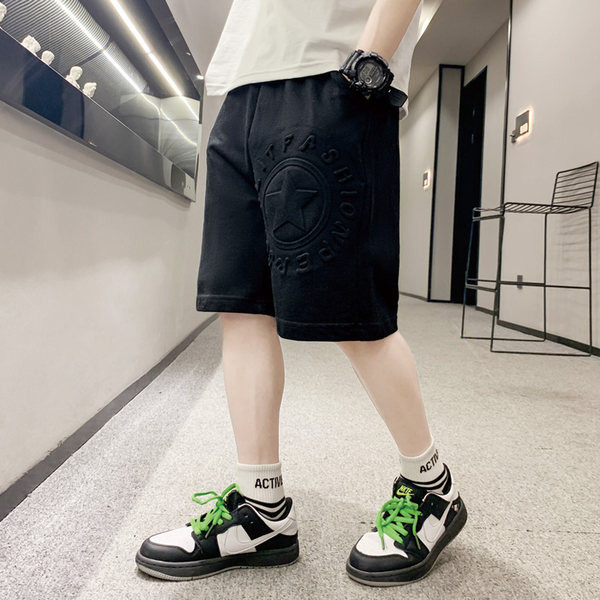 Taskute ja kirjaga laste lühikesed püksid poistele