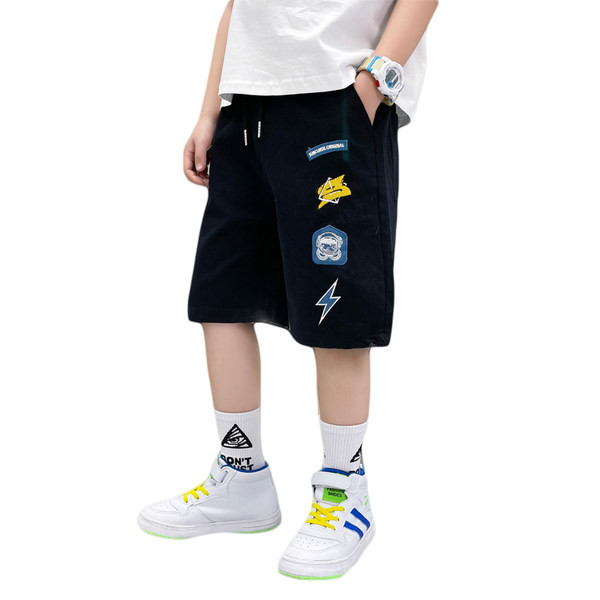 Laste lühikesed püksid tikandite ja lipsudega