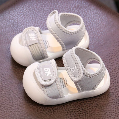 Beebi tekstiilist sandaalid kirjaga