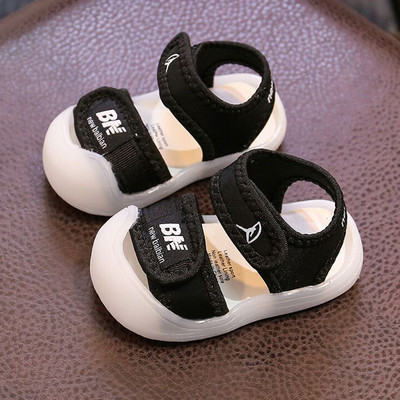 Beebi tekstiilist sandaalid kirjaga