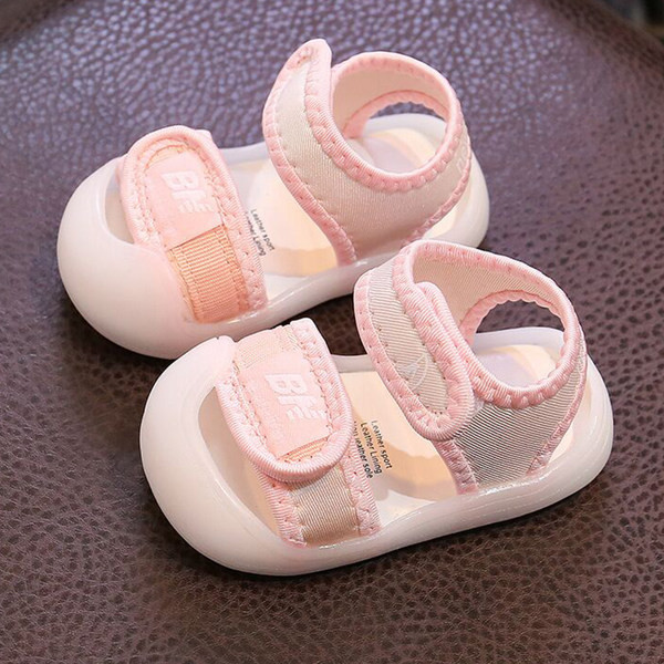 Beebi tekstiilist sandaalid kirjaga